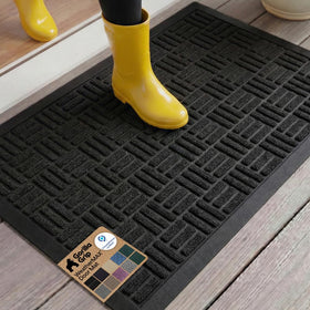 GORILLA GRIP WeatherMAX doormat at front door captures dirt and moisture.