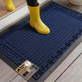Gorilla Grip WeatherMax navy doormat with Greek keys traps dirt at entryway.