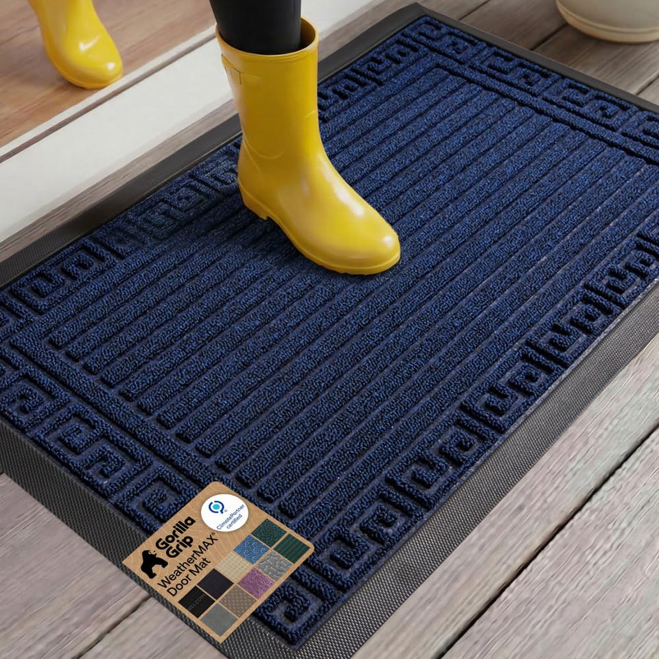 Gorilla Grip WeatherMax navy doormat with Greek keys traps dirt at entryway.