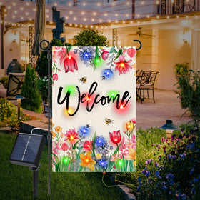 Gosuoa spring flag displaying Welcome script glow after dark