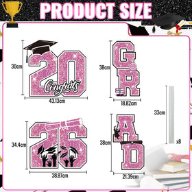 Govpy pink and white GRAD 2026 letters display boldly on lawn for celebrations.