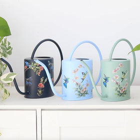 Grace and August decorative metal watering can complements home decor