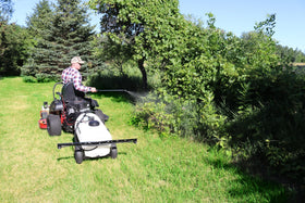 Grass Guardian hose with organizing strap keeps setup tidy.