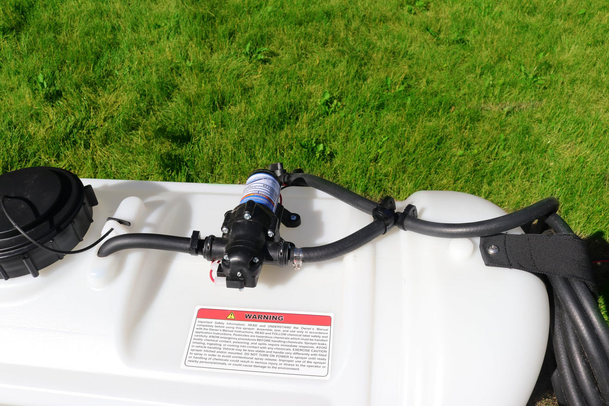 Grass Guardian spot spray gun enabling precise targeted treatment.