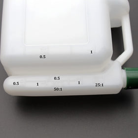 Grebizan pour spout design minimizes spills during fuel mixing.