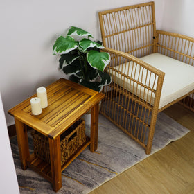 GREEN ALLUVIUM Table includes towel, plant, or decor storage on its two tiers.