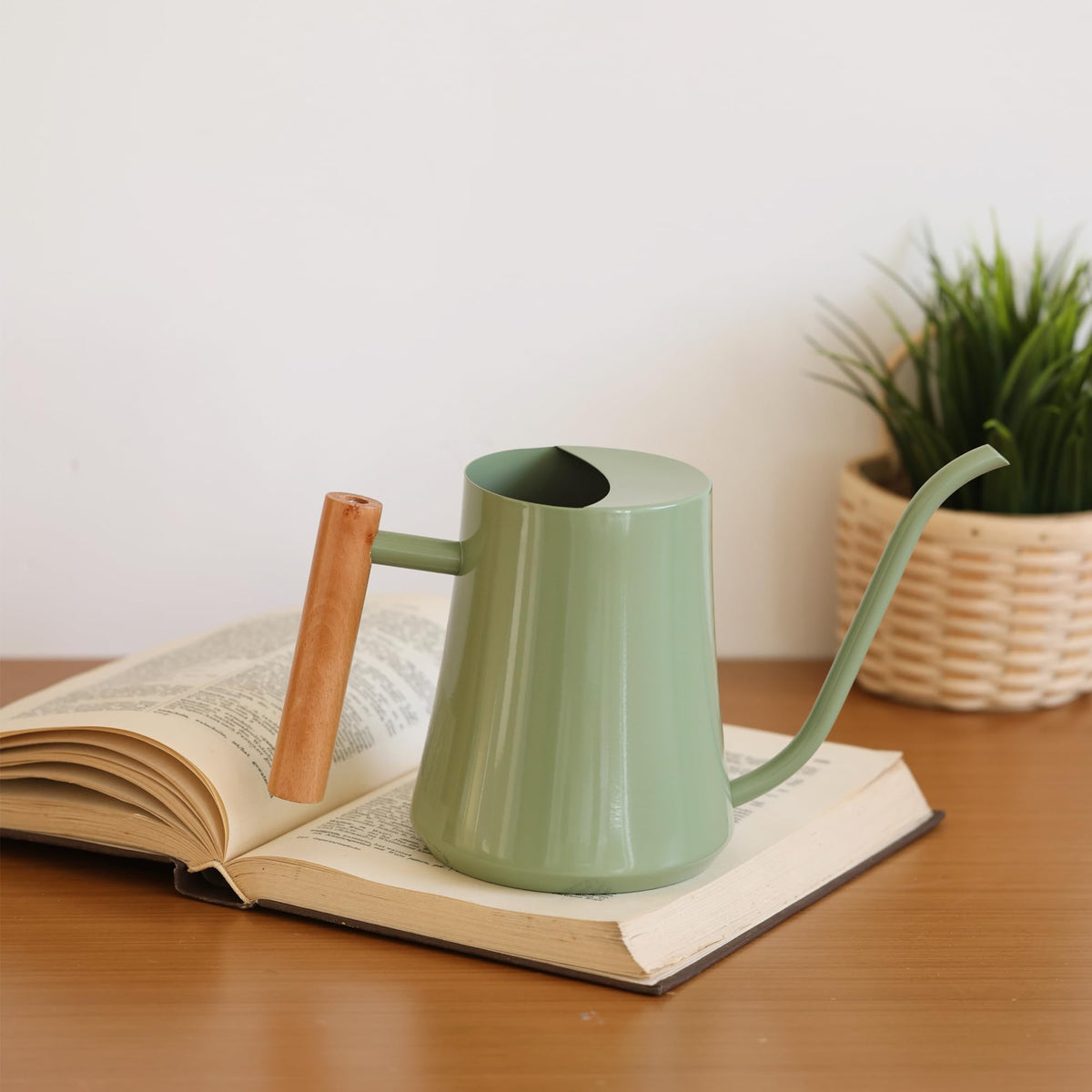 Green Moon long-neck design reaches high planters without spills