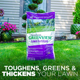 Granules from GreenView Fairway Formula spread over a lush lawn