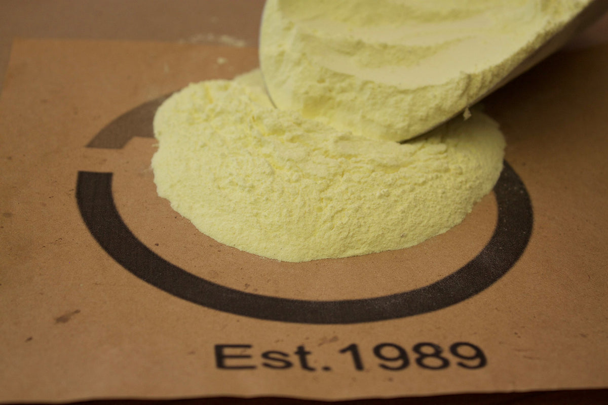 Greenway Biotech Organic Sulfur powder granules mixed into soil for sulfur nutrition
