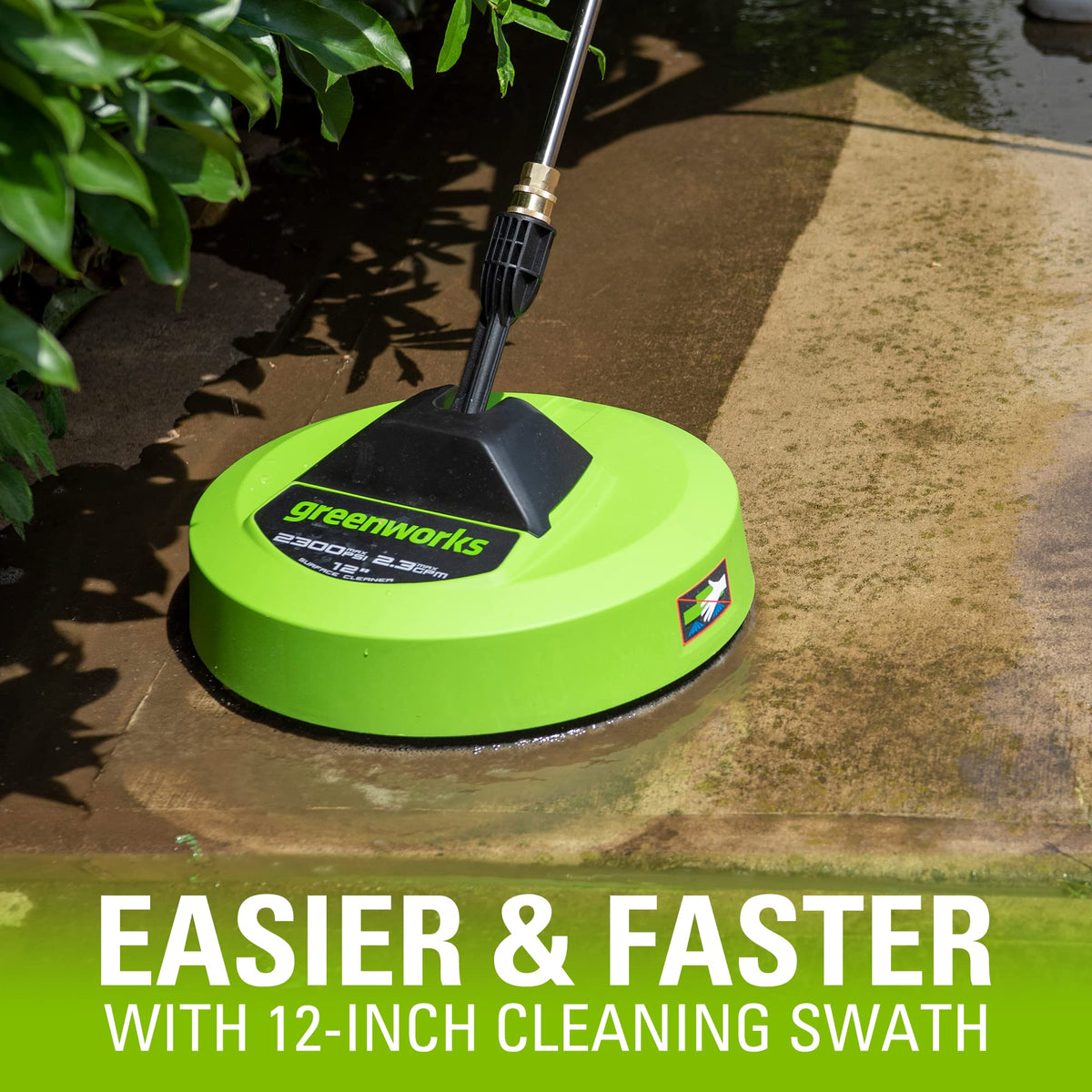 GreenWorks 12-inch surface cleaner in use on a driveway for even cleaning.