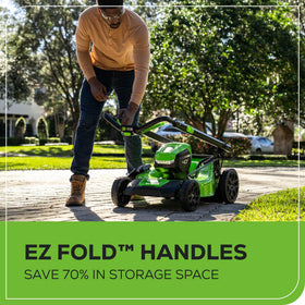 Greenworks foldable handle for compact vertical storage.