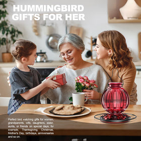 Grete Gotye glass hummingbird feeder, season-ready for year-round backyard viewing