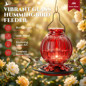 Bright red Grete Gotye feeder enhances garden decor in outdoor spaces