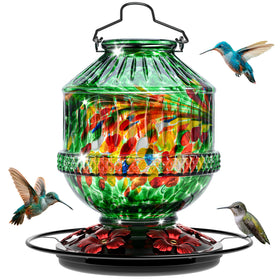 Grete Gotye hand blown glass feeder with 25 oz capacity attracts hummingbirds for vibrant backyard viewing