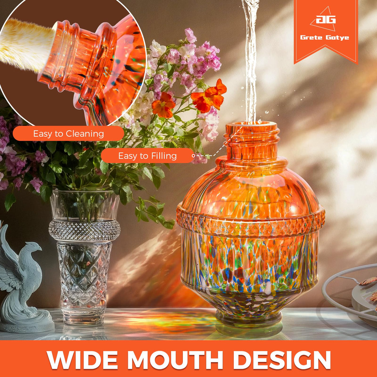 Grete Gotye hummingbird feeder orange on garden wall; perch supports hover-friendly feeding