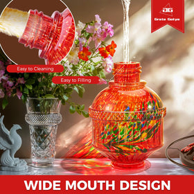 Grete Gotye phoenix-red glass feeder adds garden color