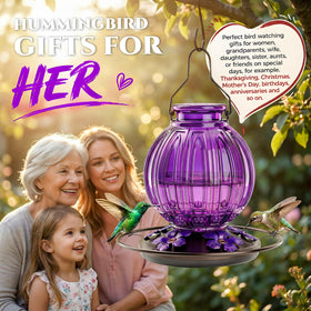 Grete Gotye purple glass feeder enhances garden decor