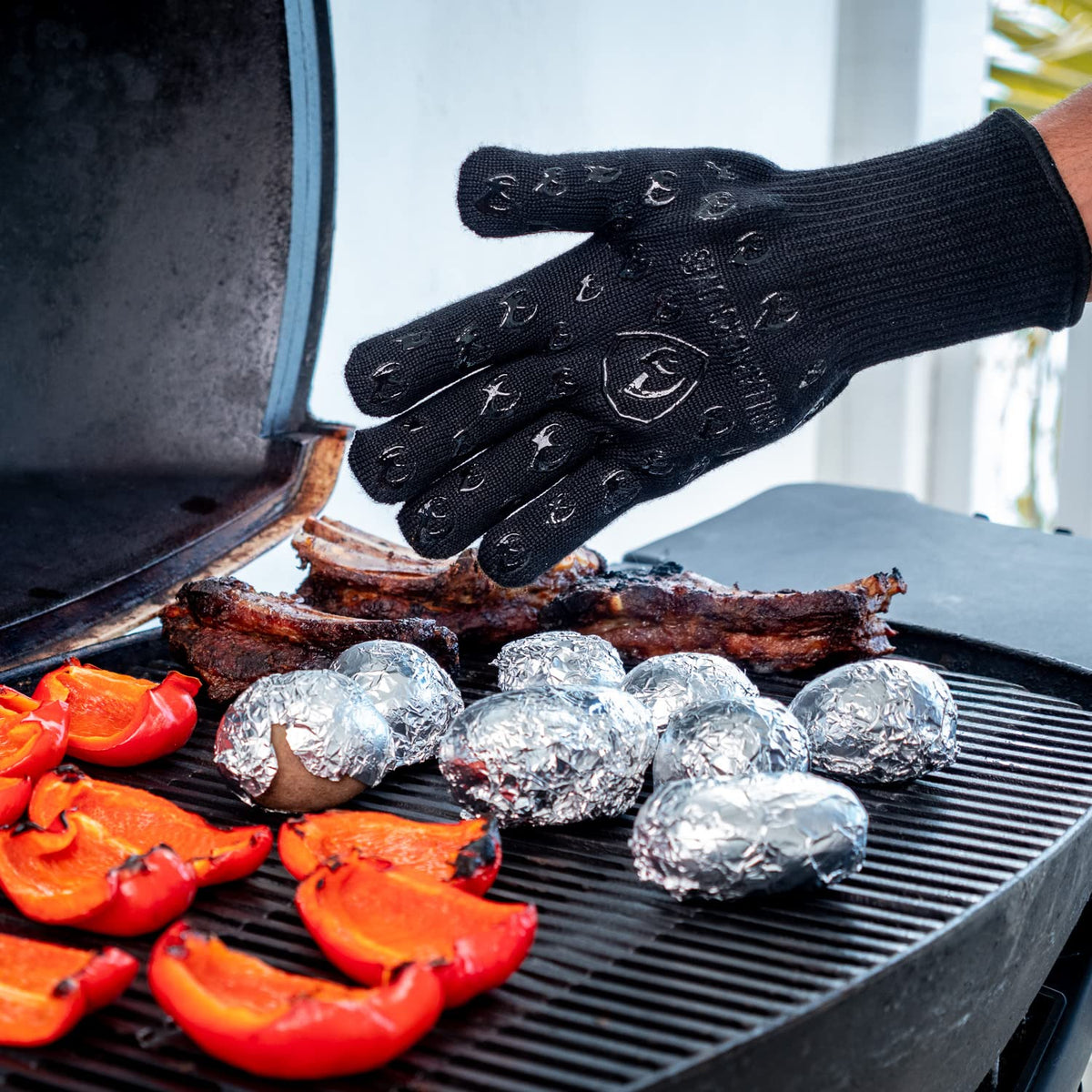 Grill Armor Gloves demonstrate EN388 Level 5 cut resistance for sharp tools.