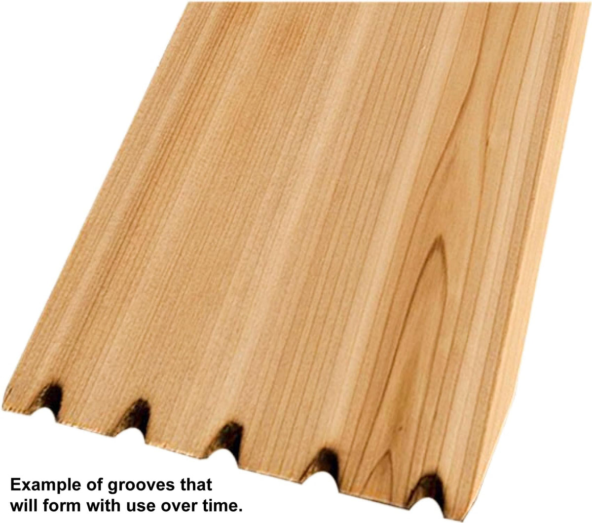 Grill Gourmet Cedar Hog in use with ergonomic handle for effective cleaning on grates