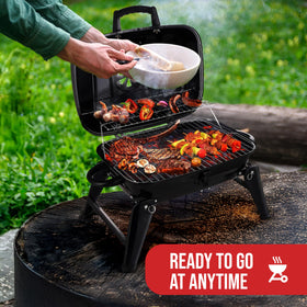 Grill Trade portable charcoal grill table-top setup ready for quick outdoor meals.