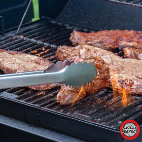 Grille Perfect tongs stored via hanging ring after cooking
