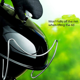 GRISUN hands-free grill accessory improves lid handling while grilling.