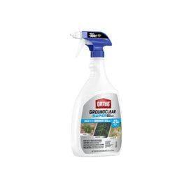 Trigger spray action applying Groundclear Ortho to weeds for quick effect.