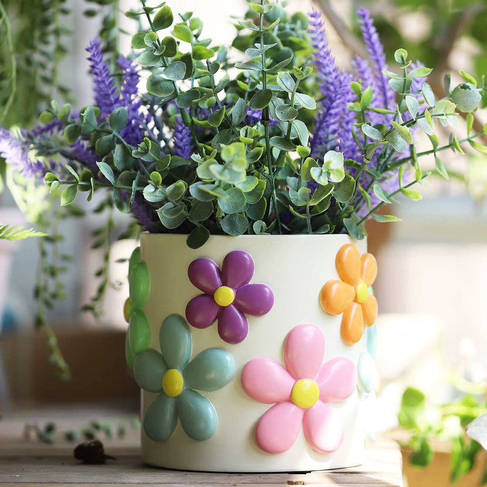 GUGUGO Colorful Flowers Planter with 360-degree painting enhances indoor display and whimsy.