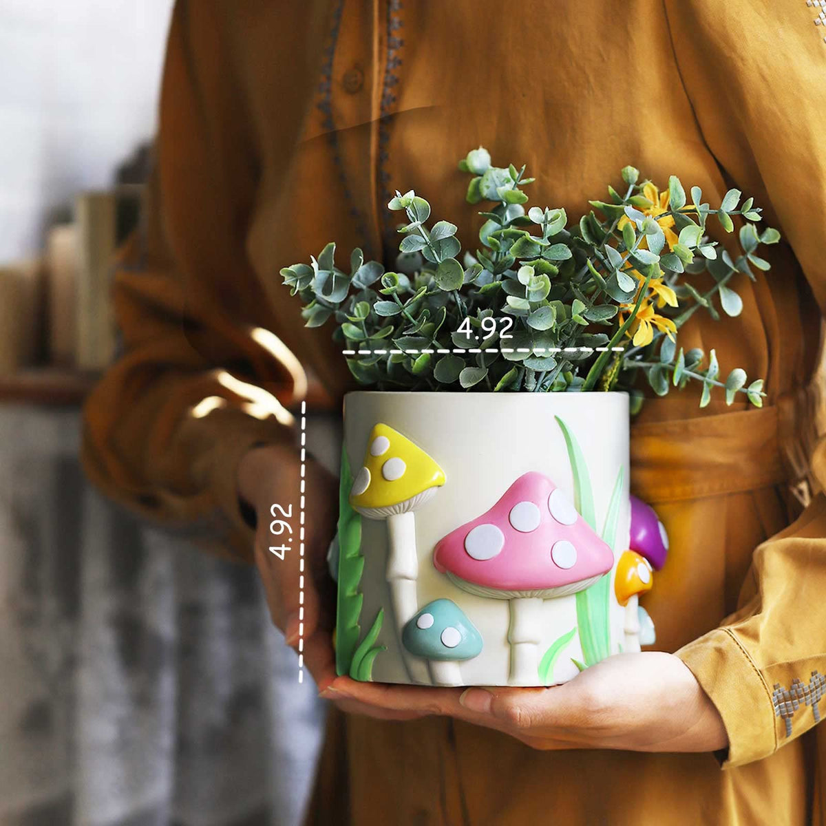 GUGUGO rainbow mushroom planter paired with small plants for chic desk decor