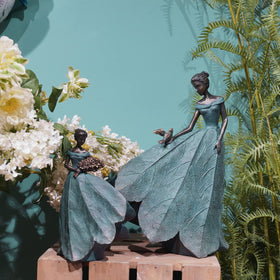 Guichifun backyard garden angel figurine, complements greenery and stone paths.