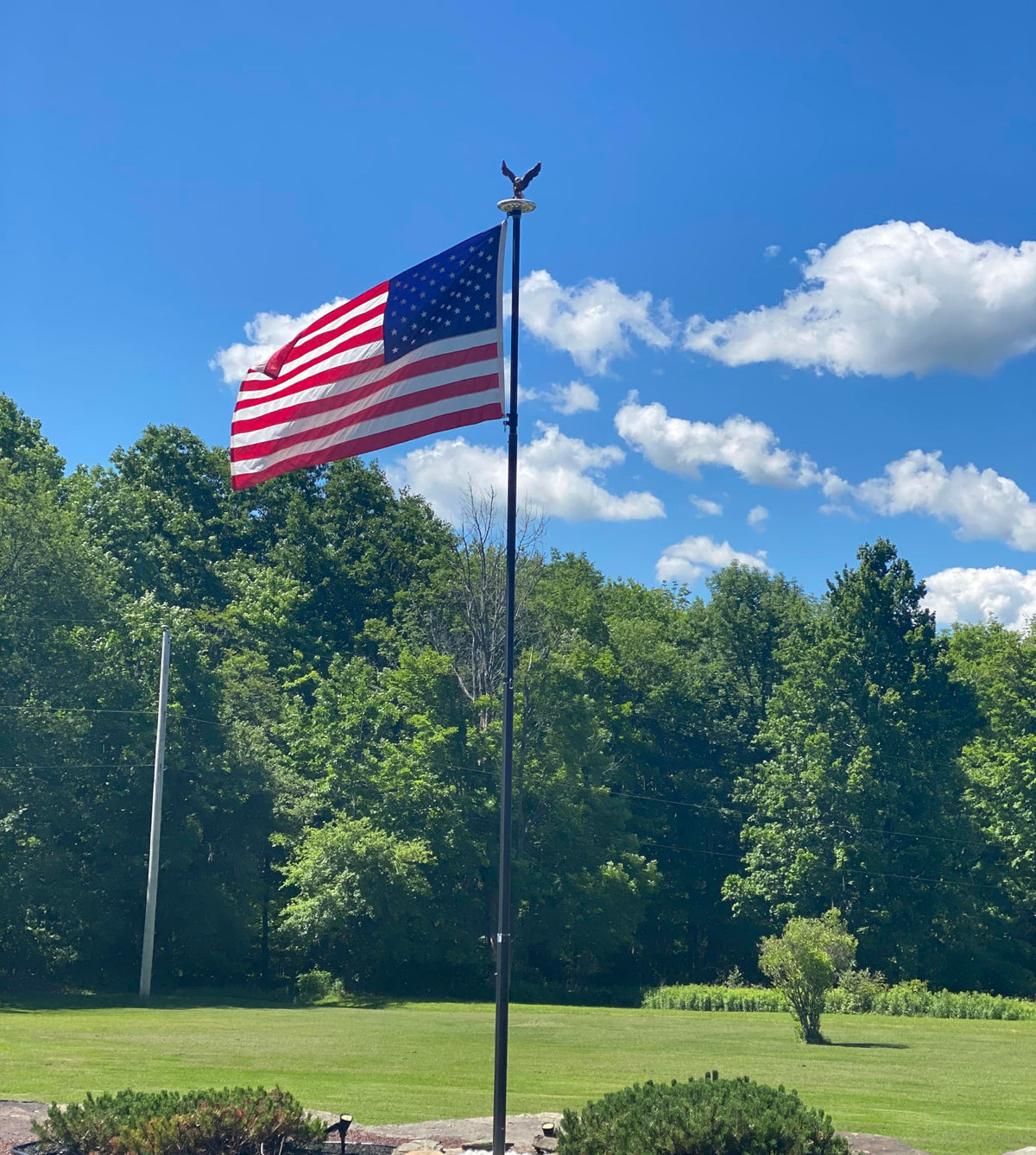 GULADUS waterproof eagle flagpole topper withstands wind and rain