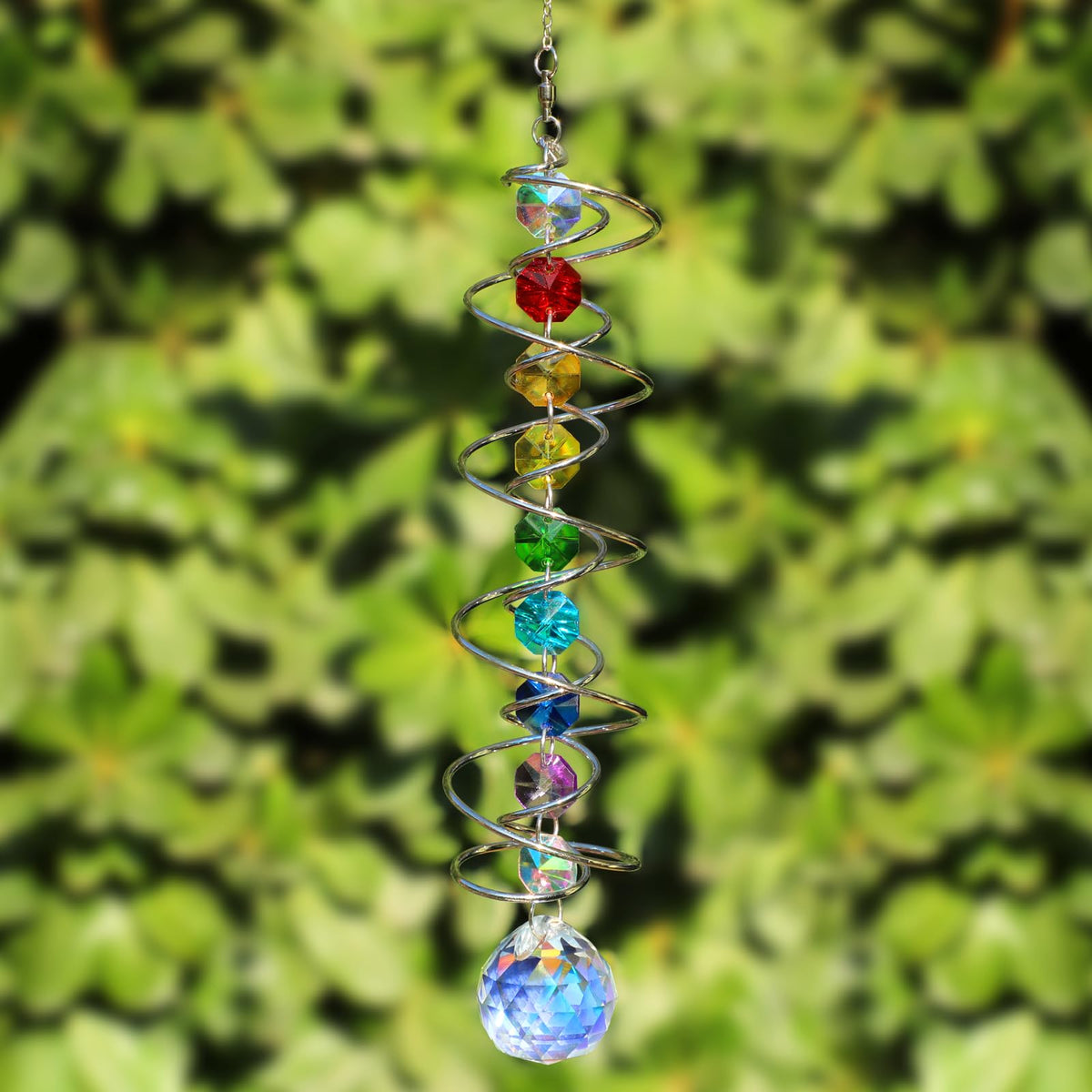 GWAHSA AB-colored crystal ball reflects light into colorful rainbows.