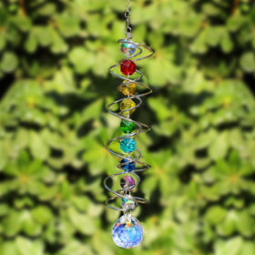 GWAHSA AB-colored crystal ball reflects light into colorful rainbows.