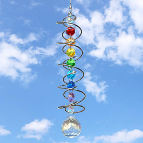 GWAHSA crystal suncatcher hangs from a hook for indoor or outdoor display.