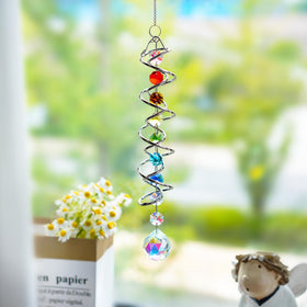 H&D HYALINE & DORA 1.18-inch crystal ball reflects colors on walls and furniture.