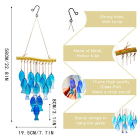 Coastal blue glass fish wind chime creates peaceful ambiance outside.