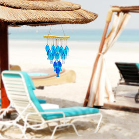Durable metal frame and glass fish offer reliable outdoor decoration.