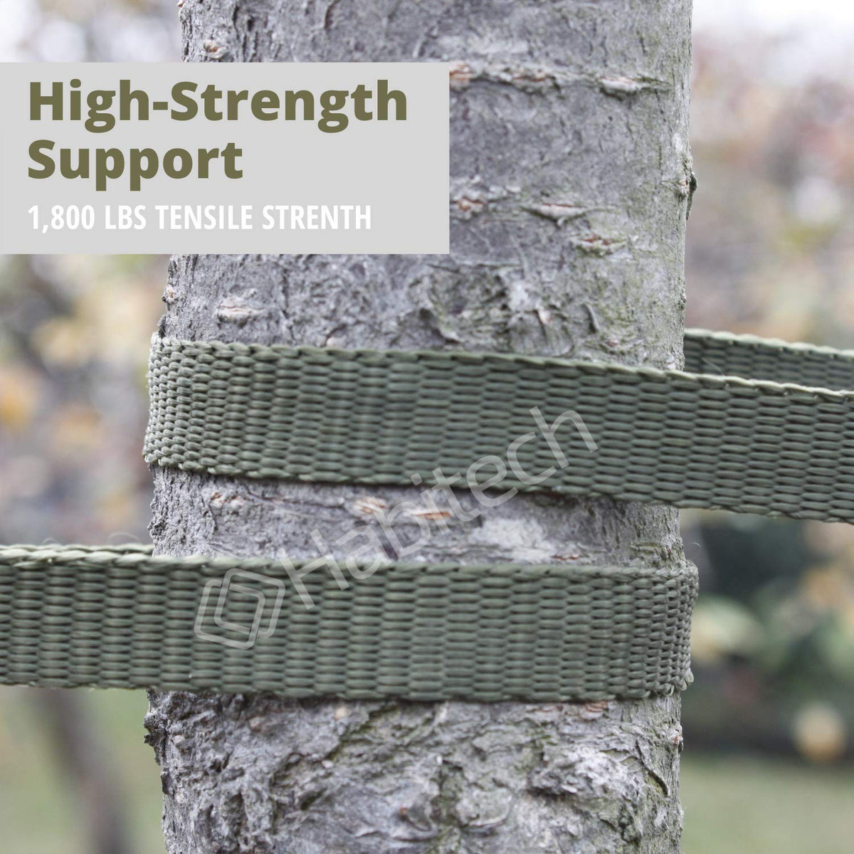 Habitech tree tie strap supporting a young tree safely in a garden