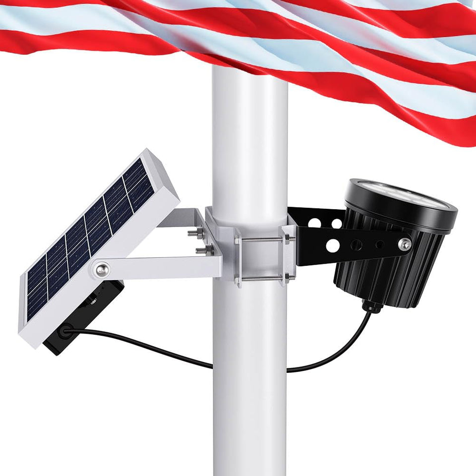 Hainee Solar Flag Pole Light with bright LED array illuminating the flag at dusk