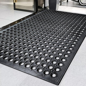 Halidec outdoor rubber floor mat with drainage holes for wet exterior areas.