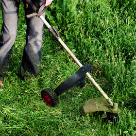 HamRoRung string-trimmer-wheel-attachment durable bracket and wheel construction.