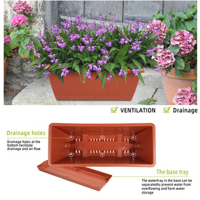 Herbs growing in a Hananojia window box planter on a bright kitchen window