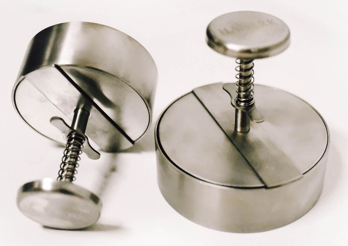 Hanerk XL Burger Press top view showing compact stainless steel design for even patties
