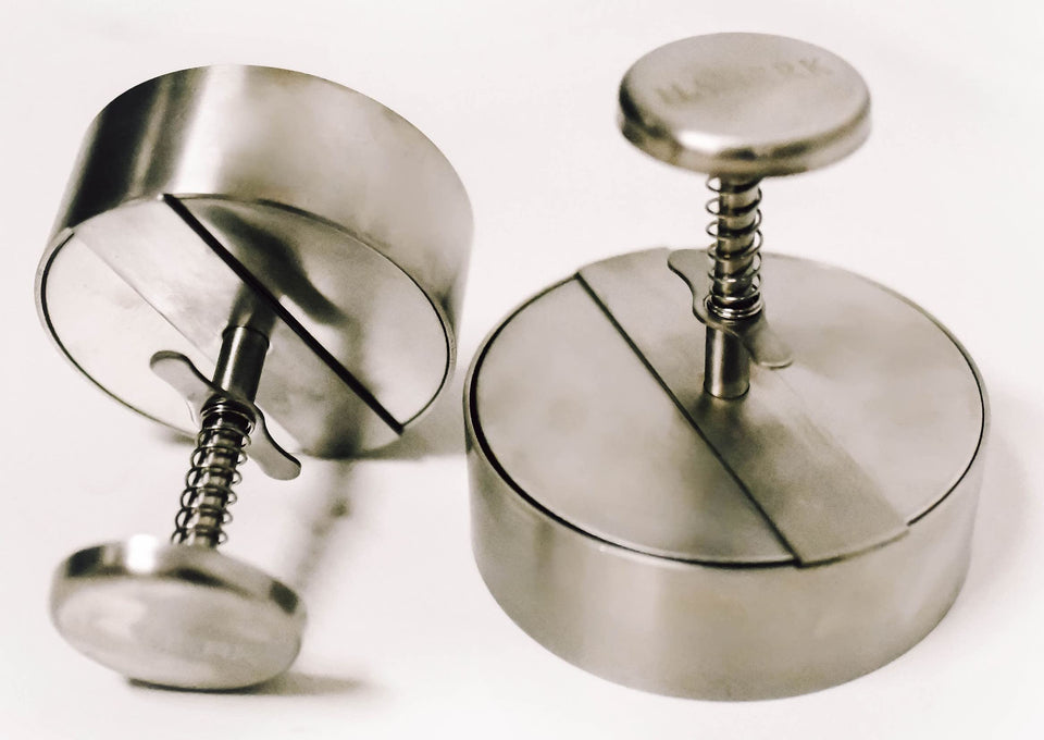Hanerk XL Burger Press top view showing compact stainless steel design for even patties