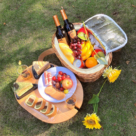 Hap Tim mini folding wine table stabilizes on grass or sand