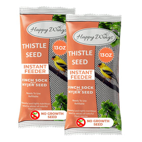 Happy Wings Nyjer seed pack closeup highlights premium seeds for backyard feeding.