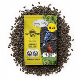 Happy Wings sunflower seeds pour into a feeder for year-round bird enjoyment