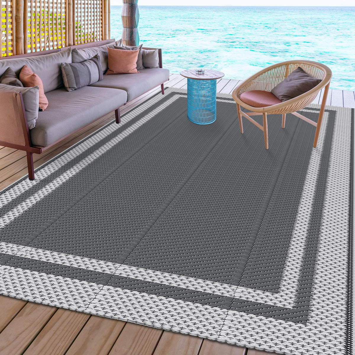 HappyTrends outdoor rug lightweight and portable, perfect for balconies and RV setups.