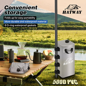 Hatway 25L water bag filled and attached to a tent leg for secure anchoring.