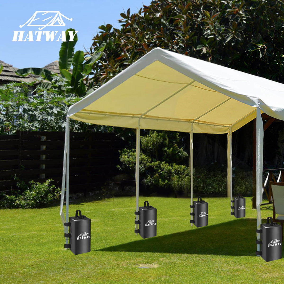 Hatway weights securing a pop-up canopy for reliable outdoor use.